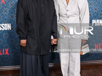 Malcolm Washington and mother Pauletta Washington arrive at the Los Angeles Premiere Of Netflix's 'The Piano Lesson' held at The Egyptian Th...