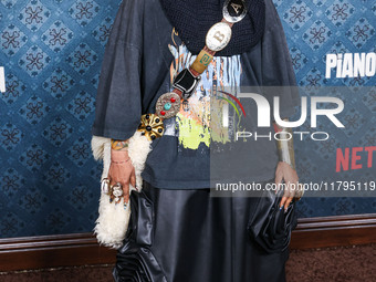 Erykah Badu arrives at the Los Angeles Premiere Of Netflix's 'The Piano Lesson' held at The Egyptian Theatre Hollywood on November 19, 2024...