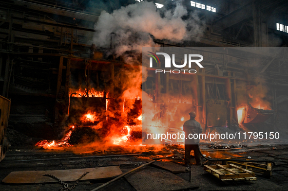 An employee works in an open-hearth furnace shop at Zaporizhstal PJSC in Zaporizhzhia, Ukraine, on November 13, 2024. NO USE RUSSIA. NO USE...