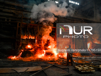 An employee works in an open-hearth furnace shop at Zaporizhstal PJSC in Zaporizhzhia, Ukraine, on November 13, 2024. NO USE RUSSIA. NO USE...