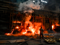 An employee works in an open-hearth furnace shop at Zaporizhstal PJSC in Zaporizhzhia, Ukraine, on November 13, 2024. NO USE RUSSIA. NO USE...