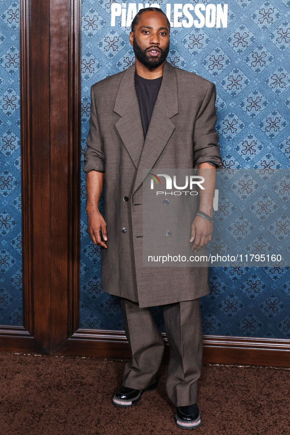 John David Washington arrives at the Los Angeles Premiere Of Netflix's 'The Piano Lesson' held at The Egyptian Theatre Hollywood on November...