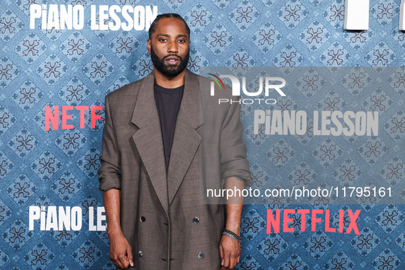 John David Washington arrives at the Los Angeles Premiere Of Netflix's 'The Piano Lesson' held at The Egyptian Theatre Hollywood on November...