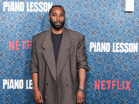 John David Washington arrives at the Los Angeles Premiere Of Netflix's 'The Piano Lesson' held at The Egyptian Theatre Hollywood on November...