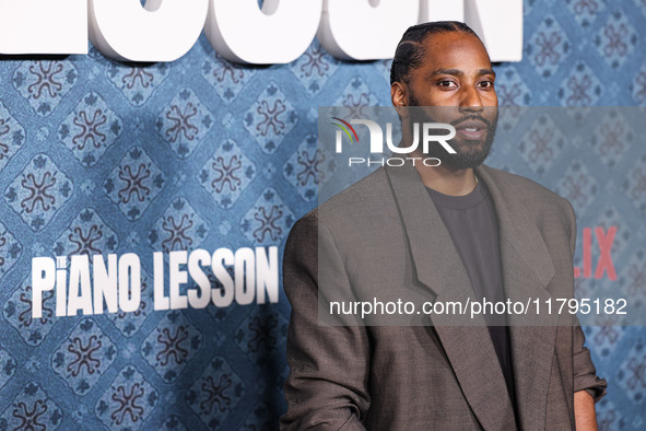 John David Washington arrives at the Los Angeles Premiere Of Netflix's 'The Piano Lesson' held at The Egyptian Theatre Hollywood on November...