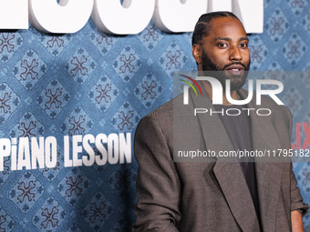 John David Washington arrives at the Los Angeles Premiere Of Netflix's 'The Piano Lesson' held at The Egyptian Theatre Hollywood on November...