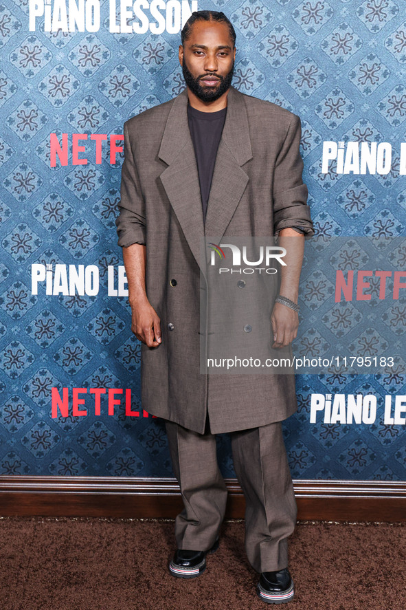 John David Washington arrives at the Los Angeles Premiere Of Netflix's 'The Piano Lesson' held at The Egyptian Theatre Hollywood on November...