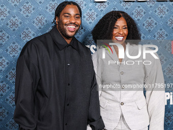 Malcolm Washington and mother Pauletta Washington arrive at the Los Angeles Premiere Of Netflix's 'The Piano Lesson' held at The Egyptian Th...