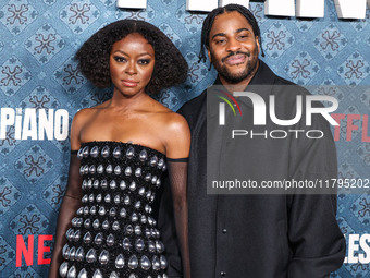 Danielle Deadwyler and Malcolm Washington arrive at the Los Angeles Premiere Of Netflix's 'The Piano Lesson' held at The Egyptian Theatre Ho...