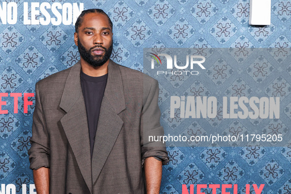 John David Washington arrives at the Los Angeles Premiere Of Netflix's 'The Piano Lesson' held at The Egyptian Theatre Hollywood on November...