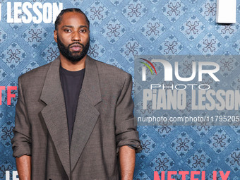 John David Washington arrives at the Los Angeles Premiere Of Netflix's 'The Piano Lesson' held at The Egyptian Theatre Hollywood on November...