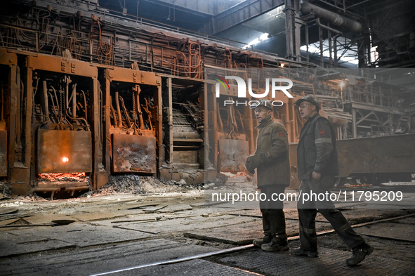 Employees work in an open-hearth furnace shop at Zaporizhstal PJSC in Zaporizhzhia, Ukraine, on November 13, 2024. NO USE RUSSIA. NO USE BEL...