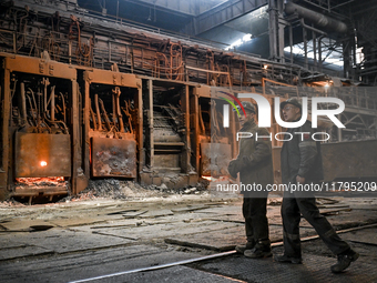 Employees work in an open-hearth furnace shop at Zaporizhstal PJSC in Zaporizhzhia, Ukraine, on November 13, 2024. NO USE RUSSIA. NO USE BEL...