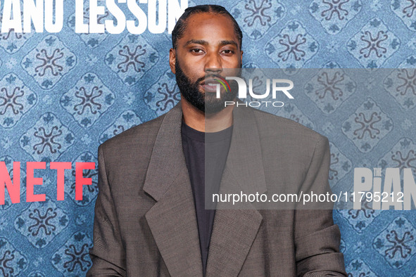 John David Washington arrives at the Los Angeles Premiere Of Netflix's 'The Piano Lesson' held at The Egyptian Theatre Hollywood on November...