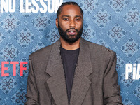 John David Washington arrives at the Los Angeles Premiere Of Netflix's 'The Piano Lesson' held at The Egyptian Theatre Hollywood on November...