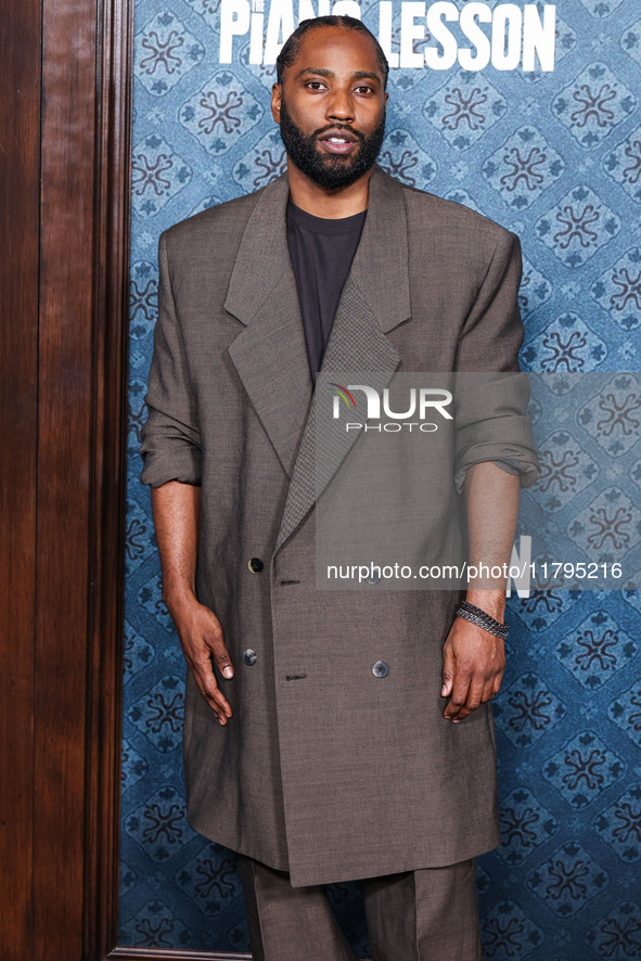 John David Washington arrives at the Los Angeles Premiere Of Netflix's 'The Piano Lesson' held at The Egyptian Theatre Hollywood on November...