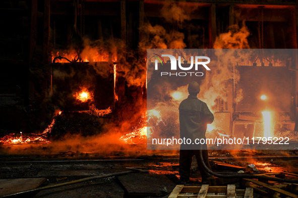 An employee works in an open-hearth furnace shop at Zaporizhstal PJSC in Zaporizhzhia, Ukraine, on November 13, 2024. NO USE RUSSIA. NO USE...