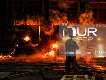 An employee works in an open-hearth furnace shop at Zaporizhstal PJSC in Zaporizhzhia, Ukraine, on November 13, 2024. NO USE RUSSIA. NO USE...