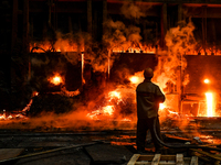 An employee works in an open-hearth furnace shop at Zaporizhstal PJSC in Zaporizhzhia, Ukraine, on November 13, 2024. NO USE RUSSIA. NO USE...