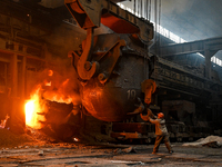 An employee works in an open-hearth furnace shop at Zaporizhstal PJSC in Zaporizhzhia, Ukraine, on November 13, 2024. NO USE RUSSIA. NO USE...