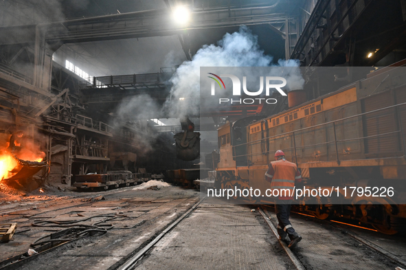 An employee works in an open-hearth furnace shop at Zaporizhstal PJSC in Zaporizhzhia, Ukraine, on November 13, 2024. NO USE RUSSIA. NO USE...