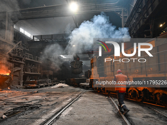 An employee works in an open-hearth furnace shop at Zaporizhstal PJSC in Zaporizhzhia, Ukraine, on November 13, 2024. NO USE RUSSIA. NO USE...