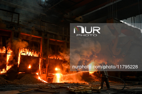 An employee works in an open-hearth furnace shop at Zaporizhstal PJSC in Zaporizhzhia, Ukraine, on November 13, 2024. NO USE RUSSIA. NO USE...