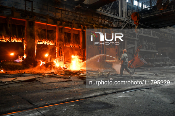 An employee works in an open-hearth furnace shop at Zaporizhstal PJSC in Zaporizhzhia, Ukraine, on November 13, 2024. NO USE RUSSIA. NO USE...