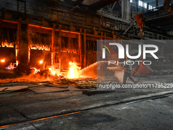 An employee works in an open-hearth furnace shop at Zaporizhstal PJSC in Zaporizhzhia, Ukraine, on November 13, 2024. NO USE RUSSIA. NO USE...