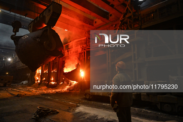 An employee works in an open-hearth furnace shop at Zaporizhstal PJSC in Zaporizhzhia, Ukraine, on November 13, 2024. NO USE RUSSIA. NO USE...