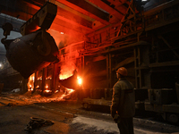 An employee works in an open-hearth furnace shop at Zaporizhstal PJSC in Zaporizhzhia, Ukraine, on November 13, 2024. NO USE RUSSIA. NO USE...