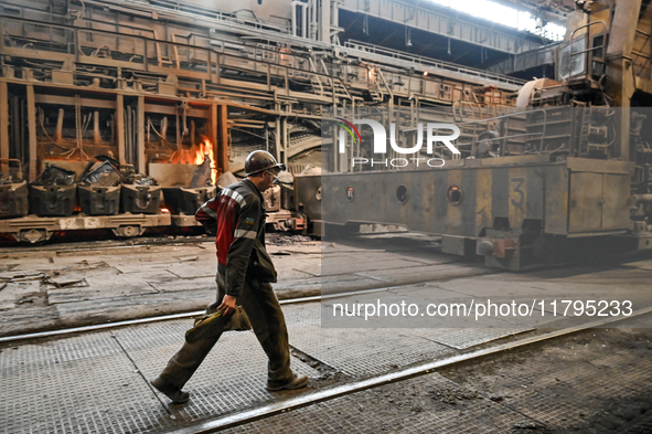 An employee works in an open-hearth furnace shop at Zaporizhstal PJSC in Zaporizhzhia, Ukraine, on November 13, 2024. NO USE RUSSIA. NO USE...