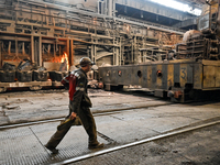 An employee works in an open-hearth furnace shop at Zaporizhstal PJSC in Zaporizhzhia, Ukraine, on November 13, 2024. NO USE RUSSIA. NO USE...