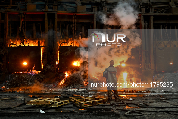 An employee works in an open-hearth furnace shop at Zaporizhstal PJSC in Zaporizhzhia, Ukraine, on November 13, 2024. NO USE RUSSIA. NO USE...