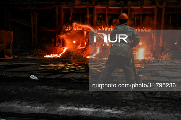 An employee works in an open-hearth furnace shop at Zaporizhstal PJSC in Zaporizhzhia, Ukraine, on November 13, 2024. NO USE RUSSIA. NO USE...