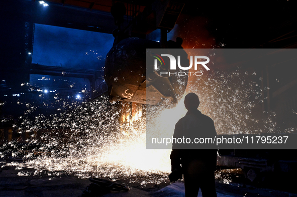 An employee works in an open-hearth furnace shop at Zaporizhstal PJSC in Zaporizhzhia, Ukraine, on November 13, 2024. NO USE RUSSIA. NO USE...