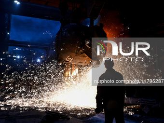 An employee works in an open-hearth furnace shop at Zaporizhstal PJSC in Zaporizhzhia, Ukraine, on November 13, 2024. NO USE RUSSIA. NO USE...