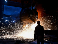 An employee works in an open-hearth furnace shop at Zaporizhstal PJSC in Zaporizhzhia, Ukraine, on November 13, 2024. NO USE RUSSIA. NO USE...