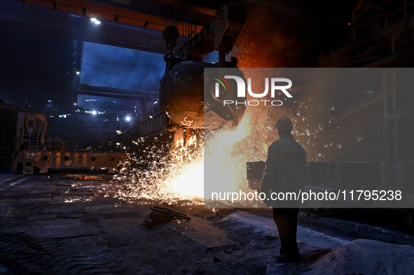 An employee works in an open-hearth furnace shop at Zaporizhstal PJSC in Zaporizhzhia, Ukraine, on November 13, 2024. NO USE RUSSIA. NO USE...