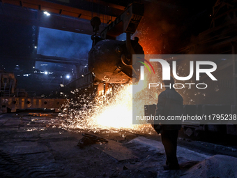 An employee works in an open-hearth furnace shop at Zaporizhstal PJSC in Zaporizhzhia, Ukraine, on November 13, 2024. NO USE RUSSIA. NO USE...