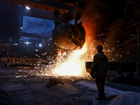 An employee works in an open-hearth furnace shop at Zaporizhstal PJSC in Zaporizhzhia, Ukraine, on November 13, 2024. NO USE RUSSIA. NO USE...