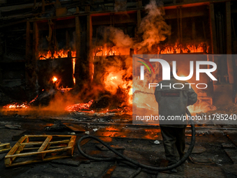 An employee works in an open-hearth furnace shop at Zaporizhstal PJSC in Zaporizhzhia, Ukraine, on November 13, 2024. NO USE RUSSIA. NO USE...