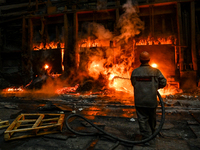 An employee works in an open-hearth furnace shop at Zaporizhstal PJSC in Zaporizhzhia, Ukraine, on November 13, 2024. NO USE RUSSIA. NO USE...