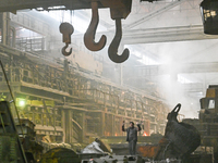 An employee works in an open-hearth furnace shop at Zaporizhstal PJSC in Zaporizhzhia, Ukraine, on November 13, 2024. NO USE RUSSIA. NO USE...