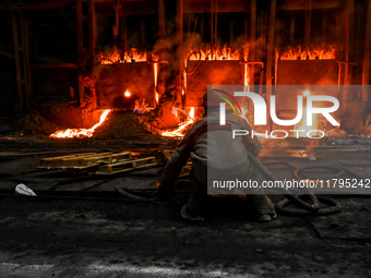 An employee works in an open-hearth furnace shop at Zaporizhstal PJSC in Zaporizhzhia, Ukraine, on November 13, 2024. NO USE RUSSIA. NO USE...