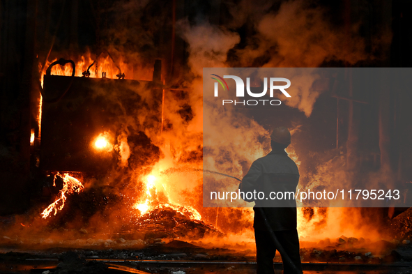 An employee works in an open-hearth furnace shop at Zaporizhstal PJSC in Zaporizhzhia, Ukraine, on November 13, 2024. NO USE RUSSIA. NO USE...