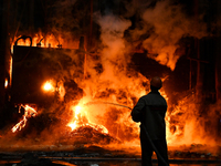 An employee works in an open-hearth furnace shop at Zaporizhstal PJSC in Zaporizhzhia, Ukraine, on November 13, 2024. NO USE RUSSIA. NO USE...