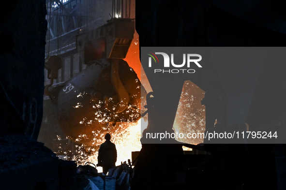 An employee works in an open-hearth furnace shop at Zaporizhstal PJSC in Zaporizhzhia, Ukraine, on November 13, 2024. NO USE RUSSIA. NO USE...