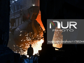 An employee works in an open-hearth furnace shop at Zaporizhstal PJSC in Zaporizhzhia, Ukraine, on November 13, 2024. NO USE RUSSIA. NO USE...