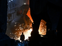 An employee works in an open-hearth furnace shop at Zaporizhstal PJSC in Zaporizhzhia, Ukraine, on November 13, 2024. NO USE RUSSIA. NO USE...